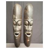 Pair of carved wood African wall masks