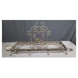 Vintage wrought-iron pots and pans hanging rack