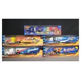Group of 5 die-cast Model NASCAR trailers in