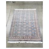Genuine hand woven oriental rug