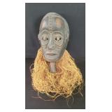 Vintage carved wood African wall mask