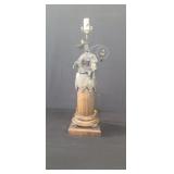 Vintage brass and wood figural lamp