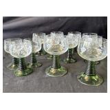 Group of 12 etched green glasses