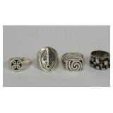 Four sterling silver rings