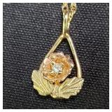 10k gold necklace and pendant with diamond
