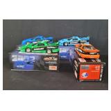 Four Dale Earnhardt 1:24 scale die-cast nascar