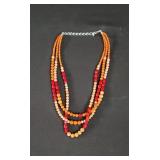 Sterling silver triple stranded coral necklace