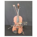 Folk art metal violin sculpture
