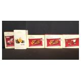 Box of Hallmark Keepsake Tonka ornaments