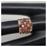 18k gold five band ring w/ red topaz and clear