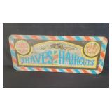 Vintage hand-painted "Shaves & Haircuts" wood sign