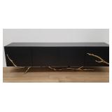 Modern credenza with brass wood branch base