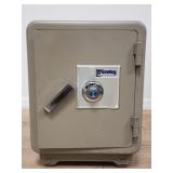 Sentry safe on casters with combination