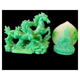 Pair of green composite statues