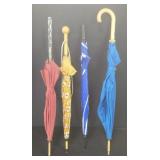 Four vintage umbrellas