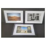Three framed nude photographs