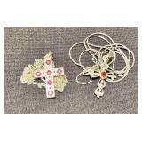 Two sterling silver cross pendants with