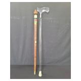Vintage acrylic cane and a  carved wood cane