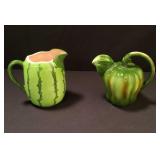 Pair of ceramic hand painted pitchers
