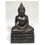 Wood sculpture sitting buddha