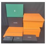 Twelve designer empty boxes