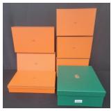 Seven designer empty boxes