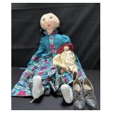 Pair of vintage dolls with shoes