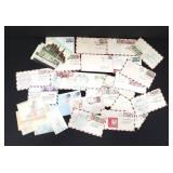 Group of vintage stamps and postcards