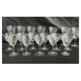 Set of eighteen etched crystal wine glasses