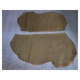 Pair of dark brown leather hides, bundled