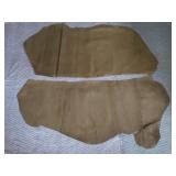 Pair of dark brown leather hides, bundled