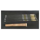 6 Carbon arrows in leather sleeve