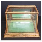 Becton Dickinson & Co. Wood and glass display case