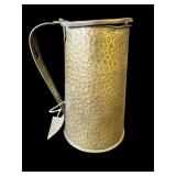 Vintage hammered brass pitcher