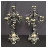 Pair of antique bronze cherub figural candelabras