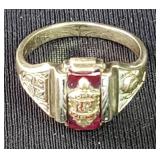 10k gold and ruby class ring.