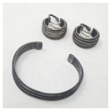 Silver cuff bracelet and hoop earrings