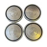 Set of vintage Ford hubcaps