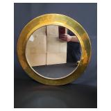Brass framed round mirror