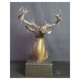 Bronze deer head bust mounted on a marble base