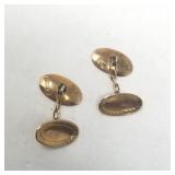 Gold cufflinks