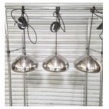 Three Tom Dixon polished stainless steel pendant