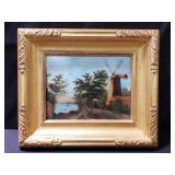 Signed painting on board on a gilt frame