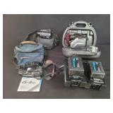 Box of miscellaneous videomovie cameras batteries,