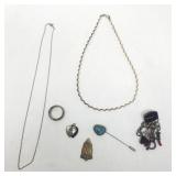 Group of sterling silver pins, necklace, ring,