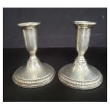 Pair of sterling silver weighted candle stick