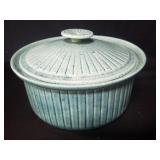 Vintage green pottery casserole dish with lid