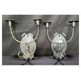 Pair of cast iron candle scones