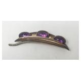 Sterling silver pin with amethyst stones