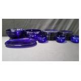 Group of cobalt blue glass plates and bowl